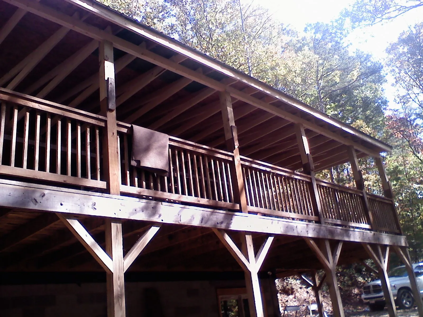 Timber framing under a new elevated porch and deck — Roof Leak Repair in Stewart by Roofing Brothers